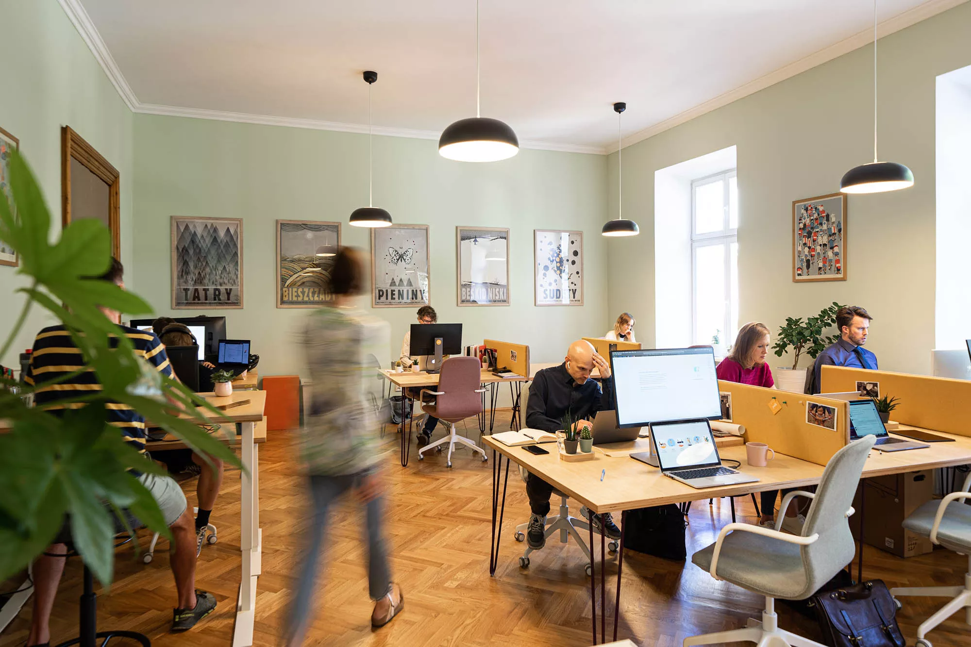 Dedicated desk workspace at Yolk with ergonomic chair and monitor
